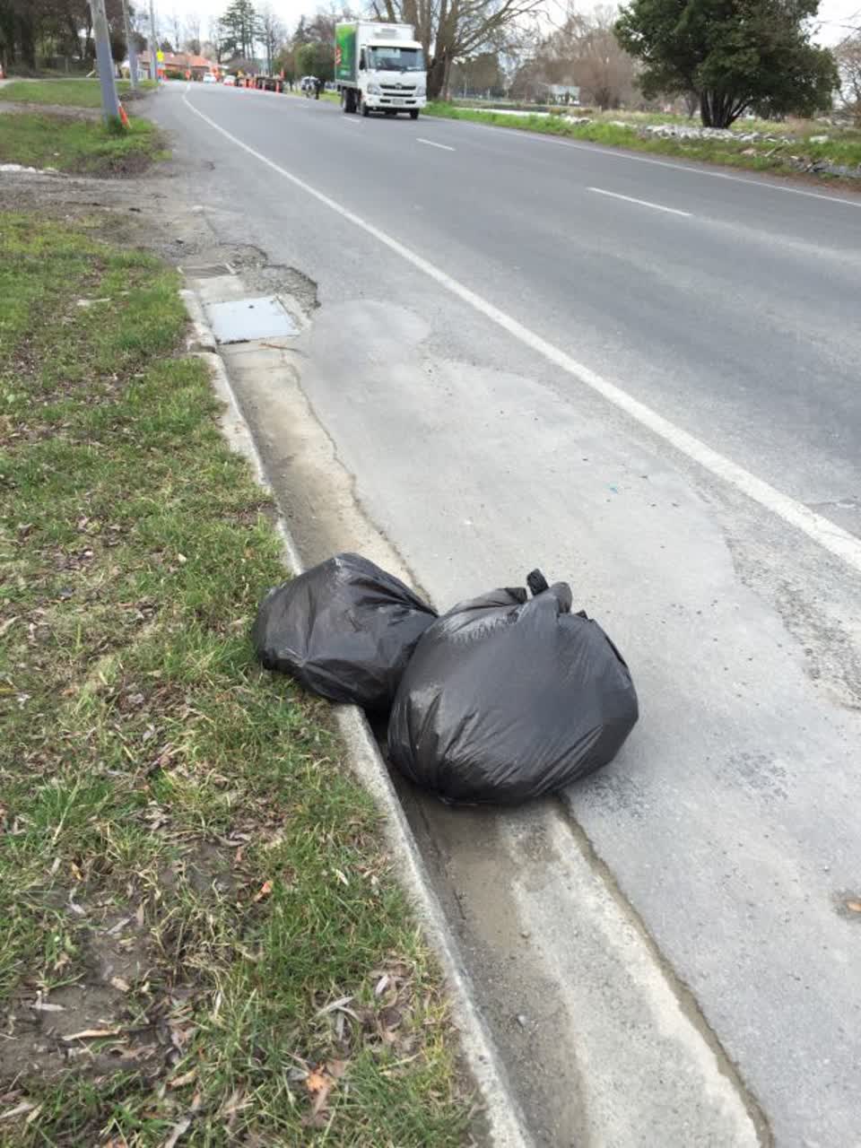 The photograph attached to this rubbish/recycling report