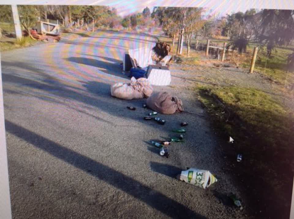 The photograph attached to this rubbish/recycling report
