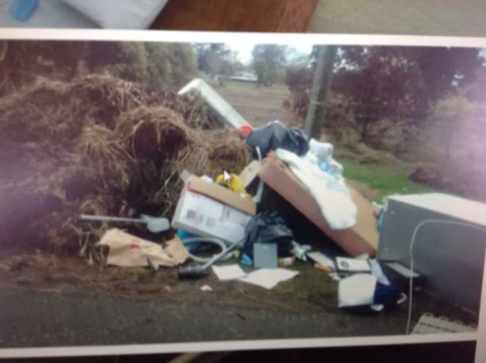 The photograph attached to this rubbish/recycling report