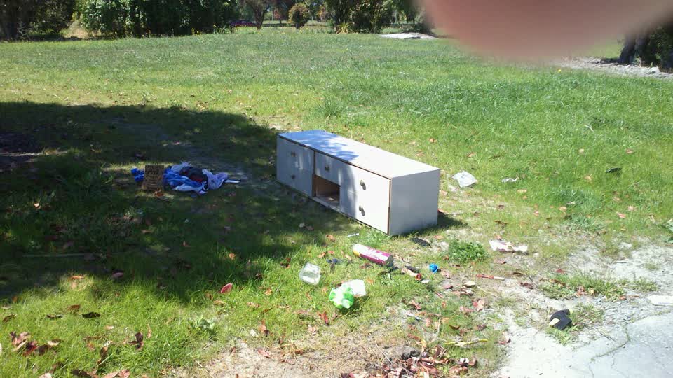 The photograph attached to this rubbish/recycling report