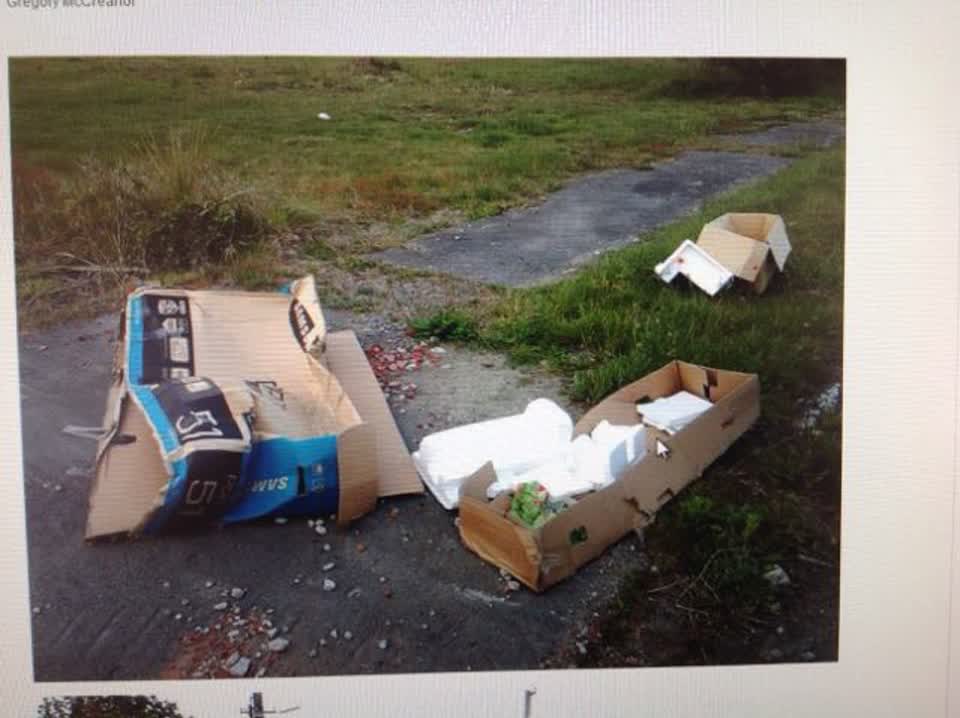 The photograph attached to this rubbish/recycling report