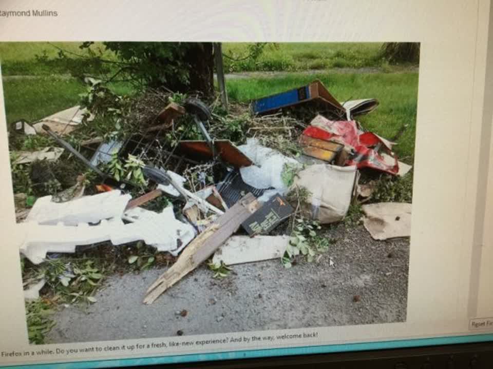 The photograph attached to this rubbish/recycling report