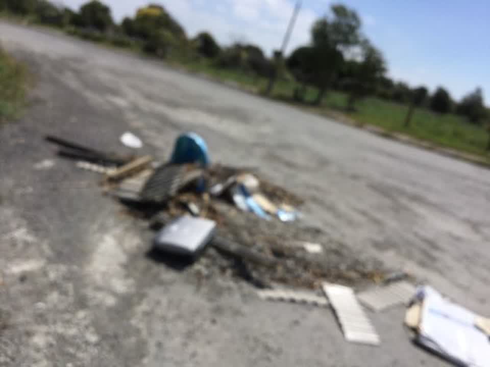 The photograph attached to this rubbish/recycling report