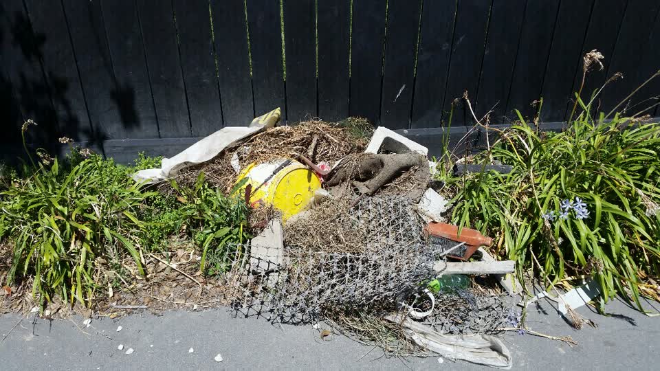 The photograph attached to this rubbish/recycling report