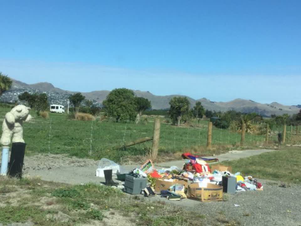 The photograph attached to this rubbish/recycling report