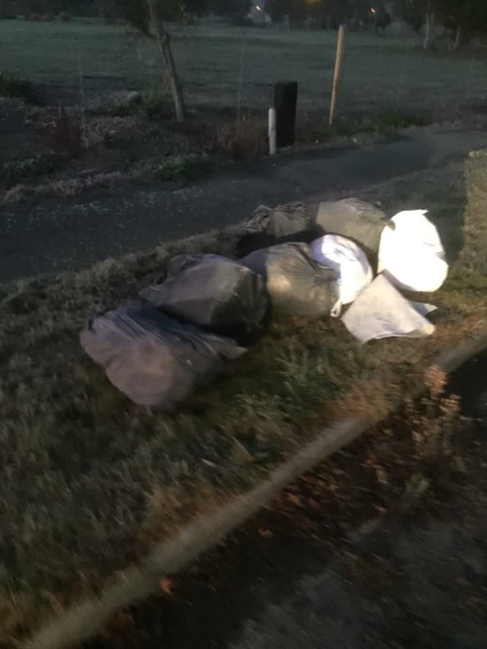 The photograph attached to this rubbish/recycling report