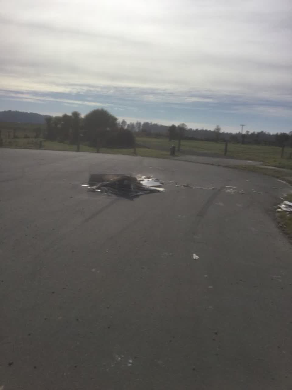 The photograph attached to this rubbish/recycling report