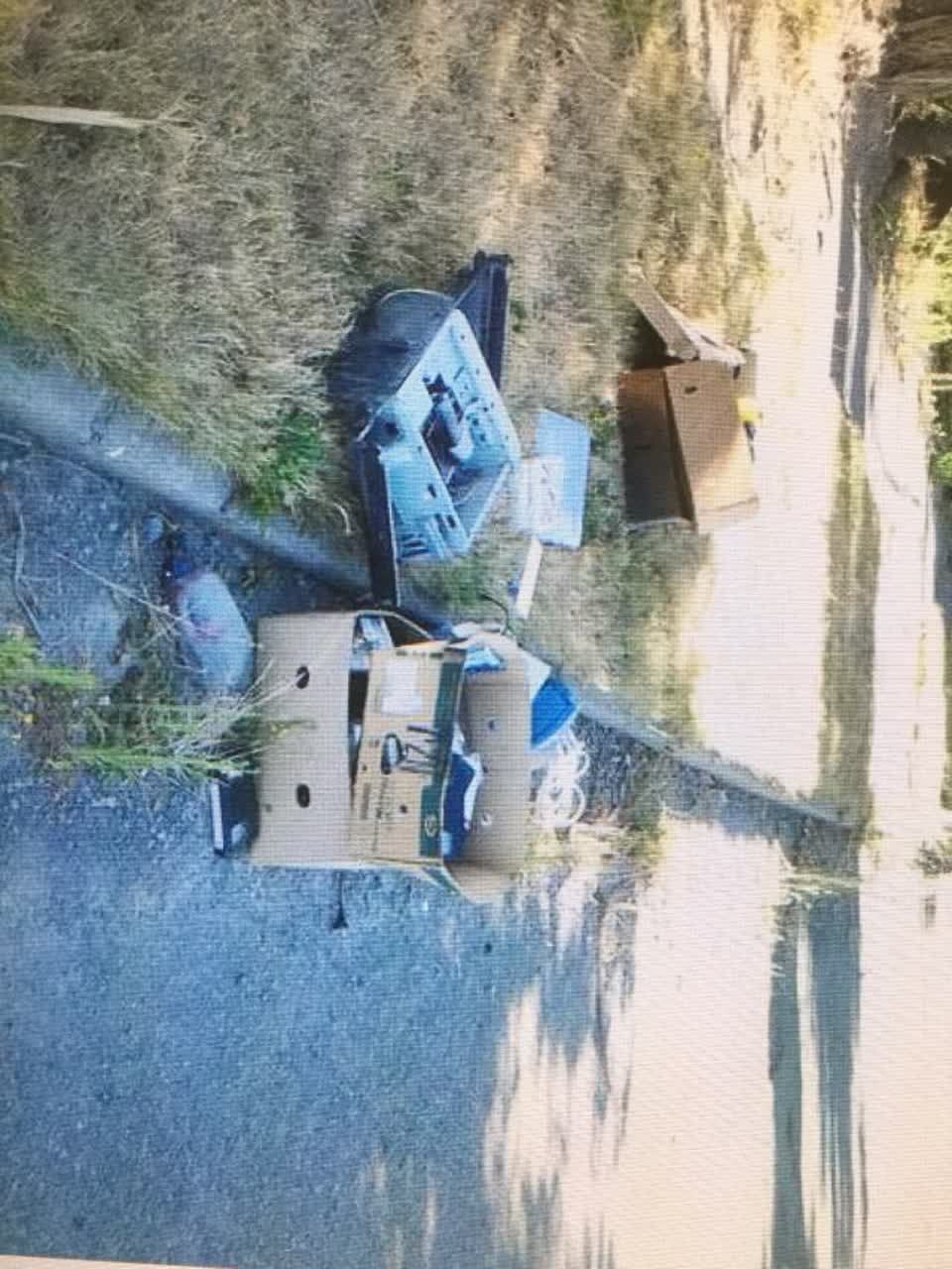 The photograph attached to this rubbish/recycling report
