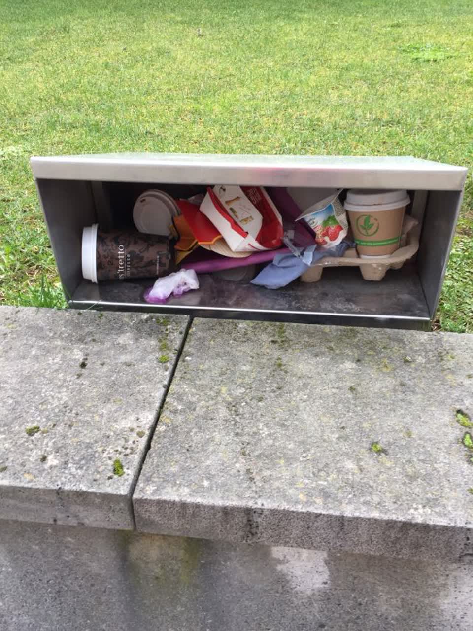 The photograph attached to this rubbish/recycling report