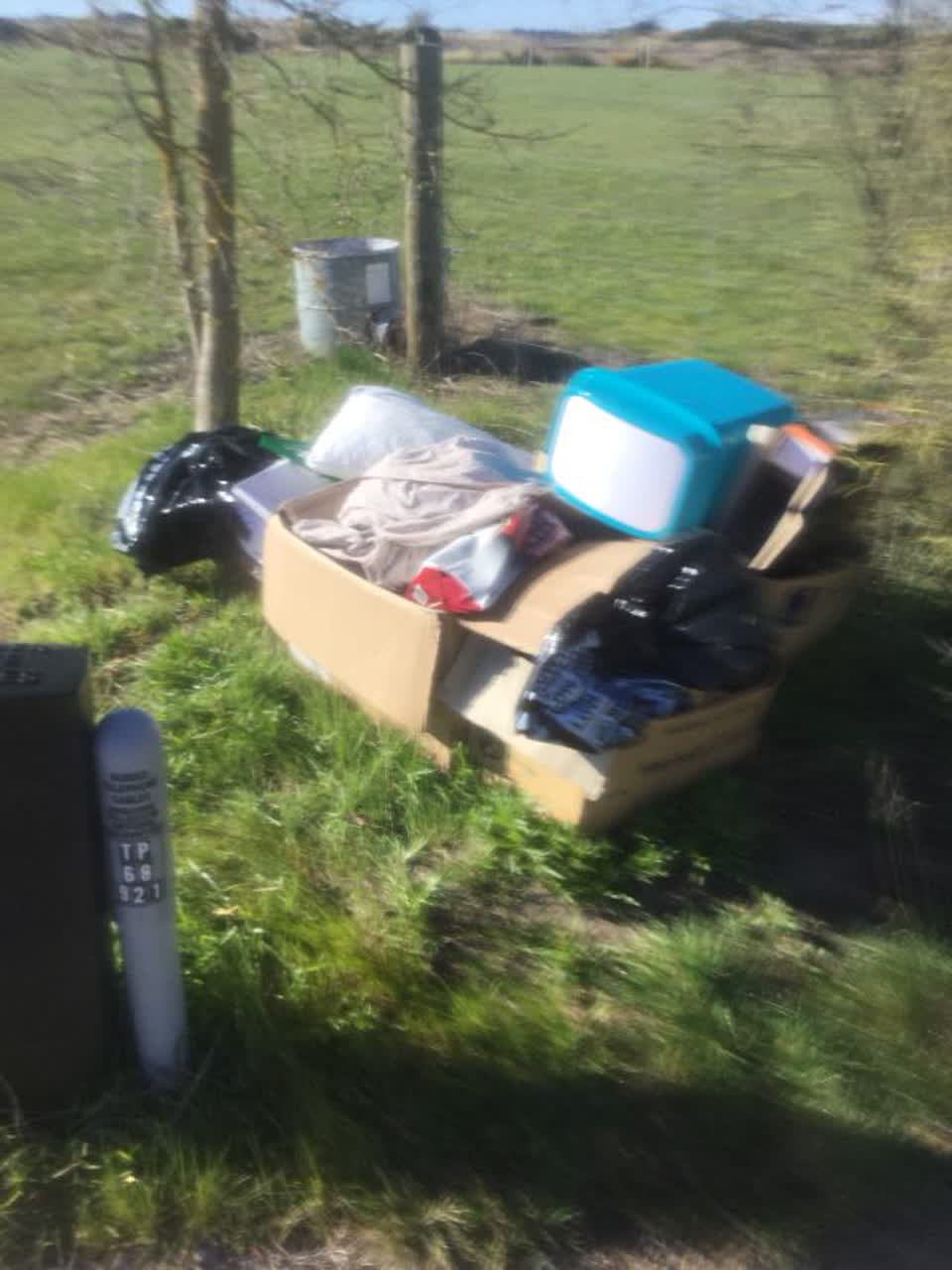 The photograph attached to this rubbish/recycling report
