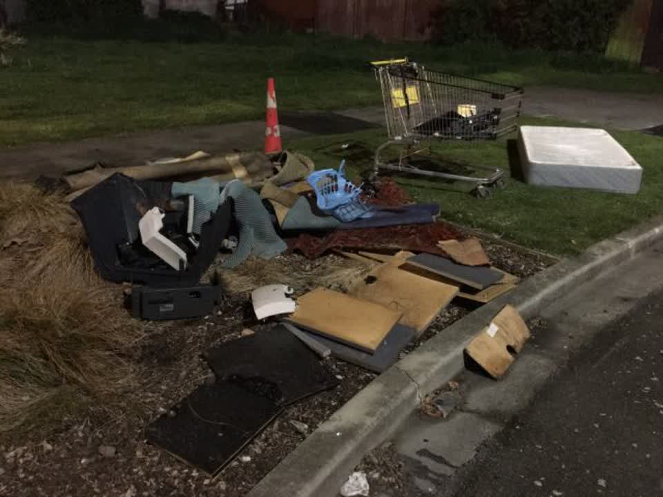 The photograph attached to this rubbish/recycling report