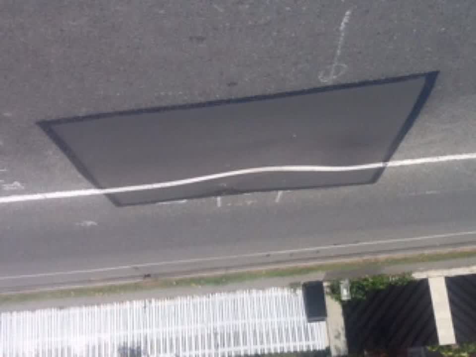 The photograph attached to this roading/streets report