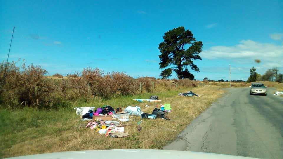 The photograph attached to this rubbish/recycling report