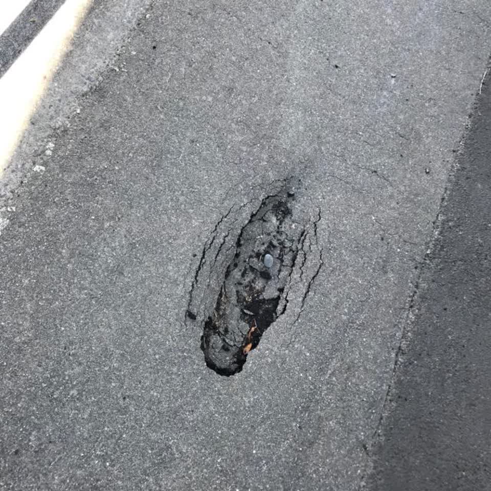The photograph attached to this roading/streets report