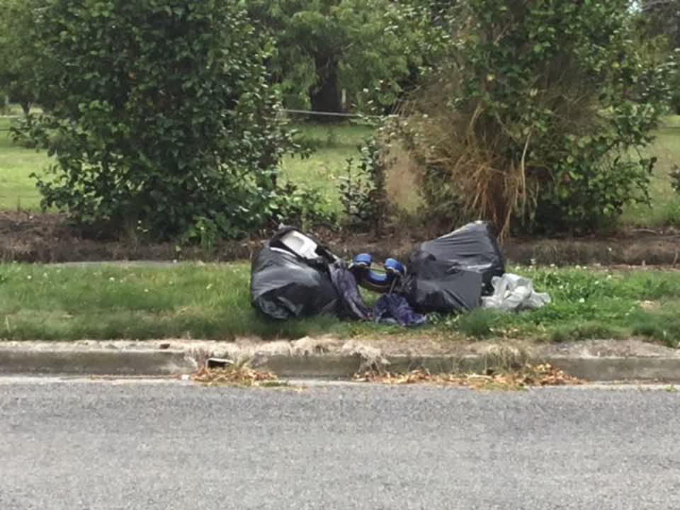 The photograph attached to this rubbish/recycling report
