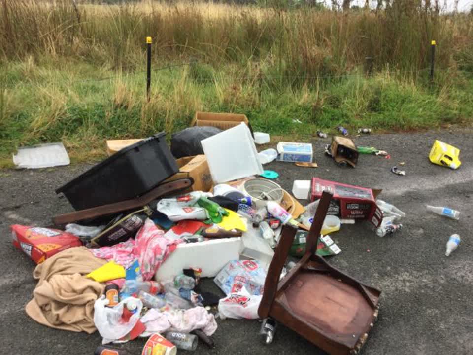 The photograph attached to this rubbish/recycling report