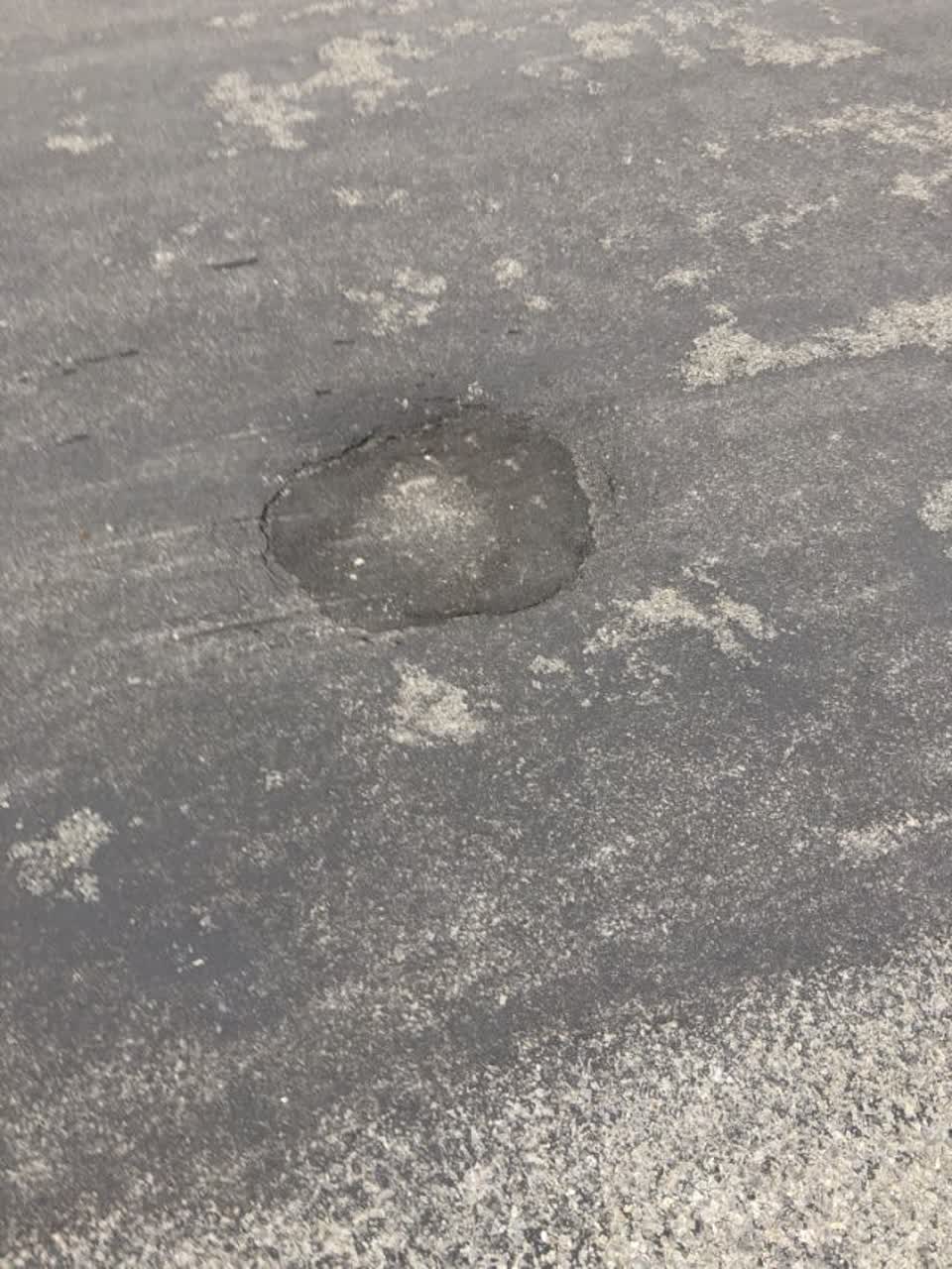 The photograph attached to this roading/streets report