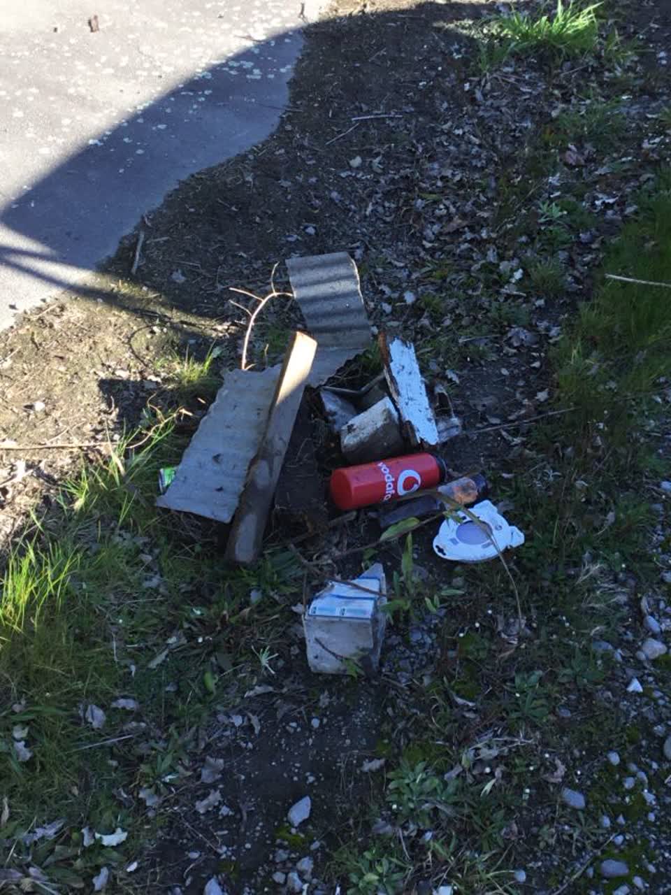The photograph attached to this rubbish/recycling report