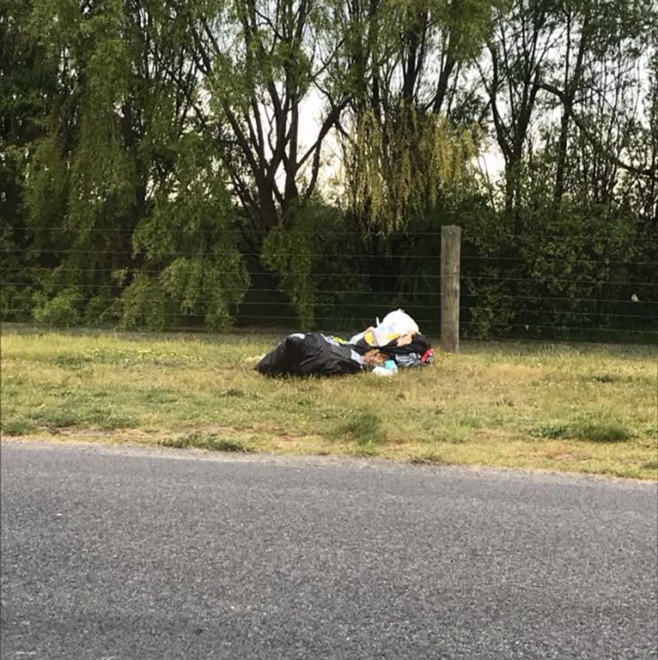 The photograph attached to this rubbish/recycling report