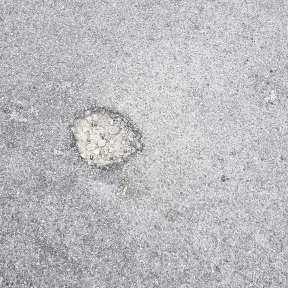 The photograph attached to this roading/streets report