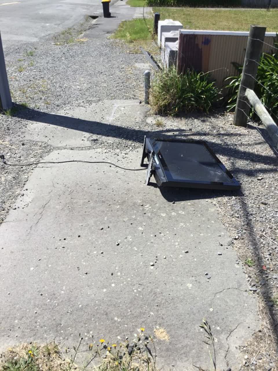 The photograph attached to this rubbish/recycling report
