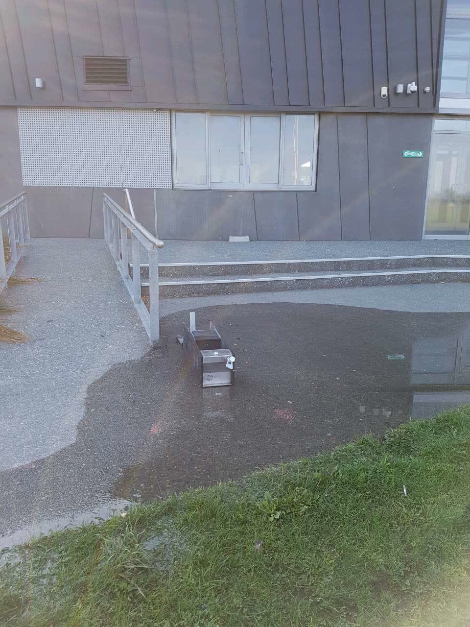 The photograph attached to this flooding report