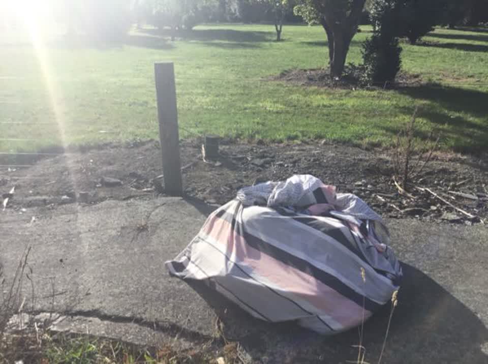 The photograph attached to this rubbish/recycling report