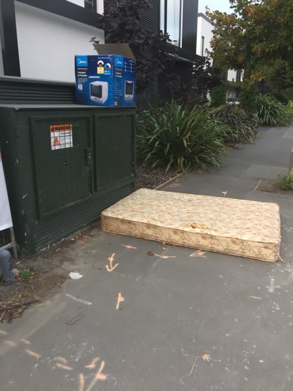 The photograph attached to this rubbish/recycling report