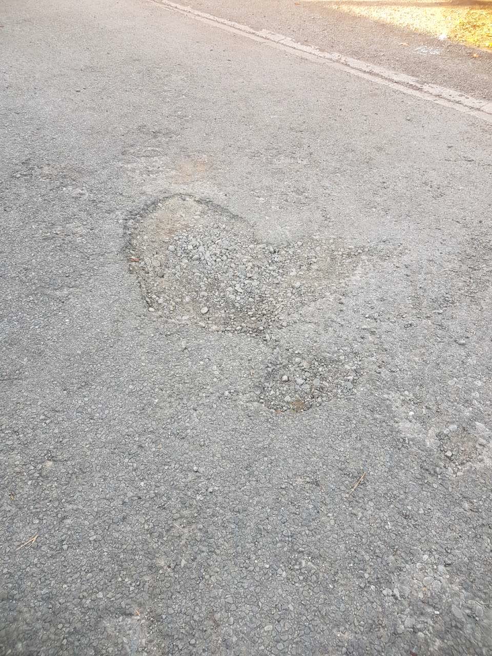 The photograph attached to this roading/streets report