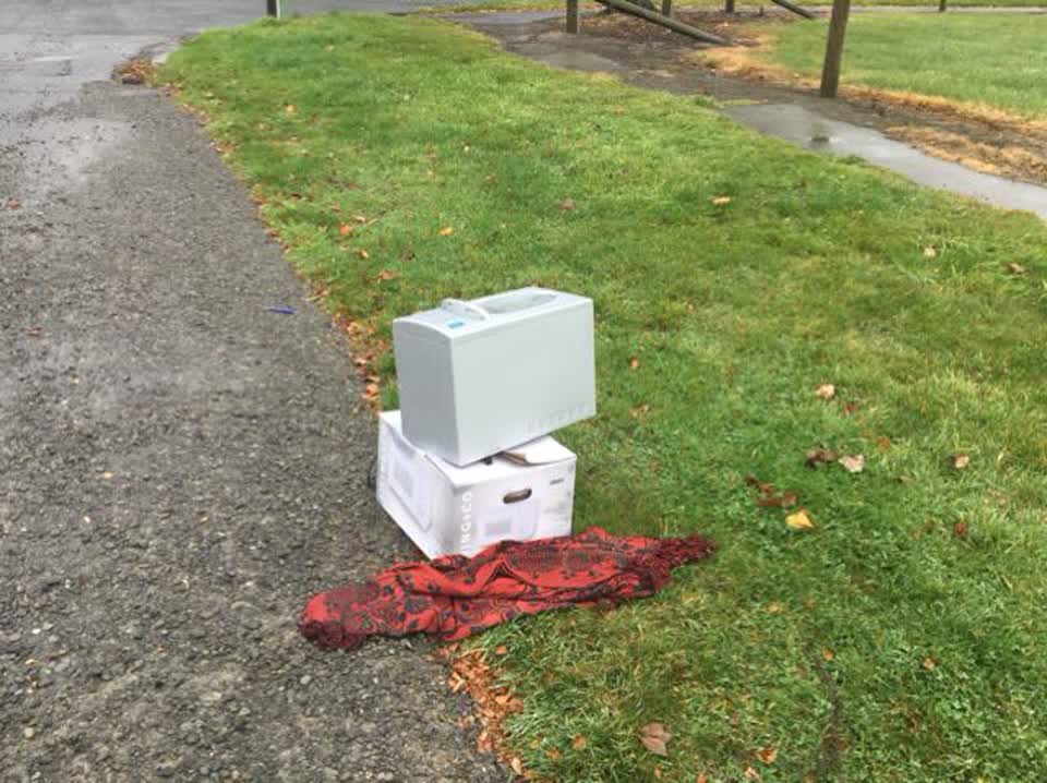The photograph attached to this rubbish/recycling report