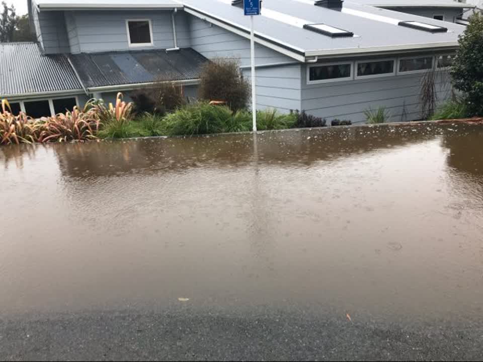 The photograph attached to this flooding report