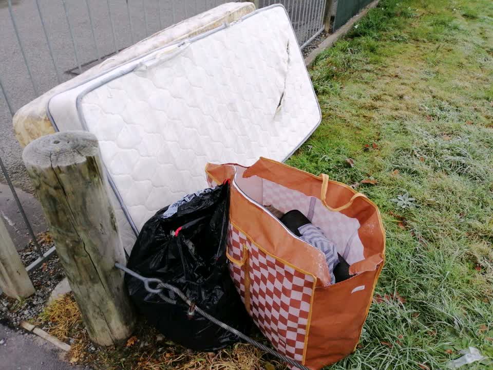 The photograph attached to this rubbish/recycling report