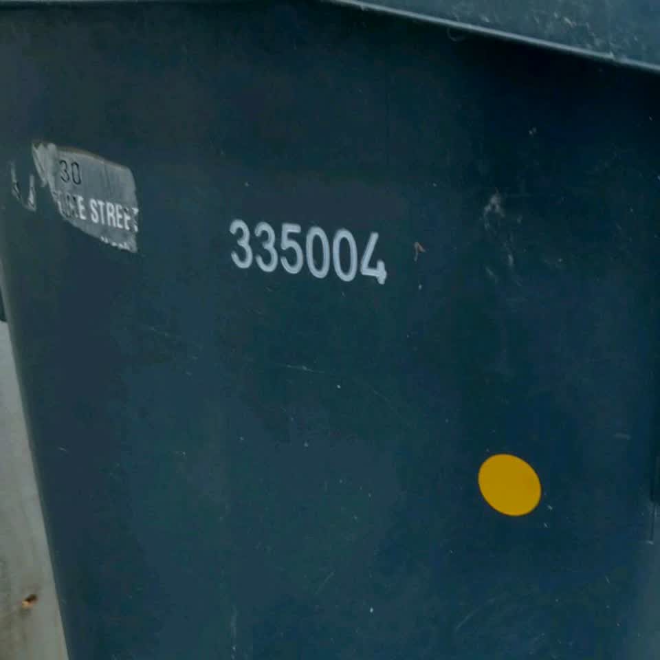 The photograph attached to this rubbish/recycling report