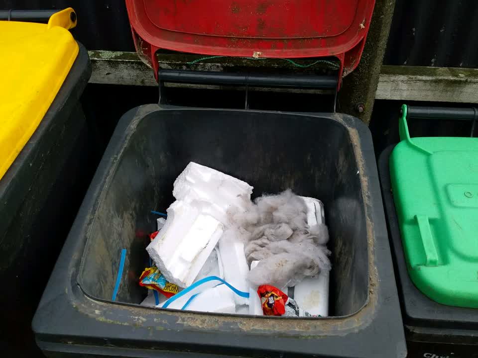 The photograph attached to this rubbish/recycling report