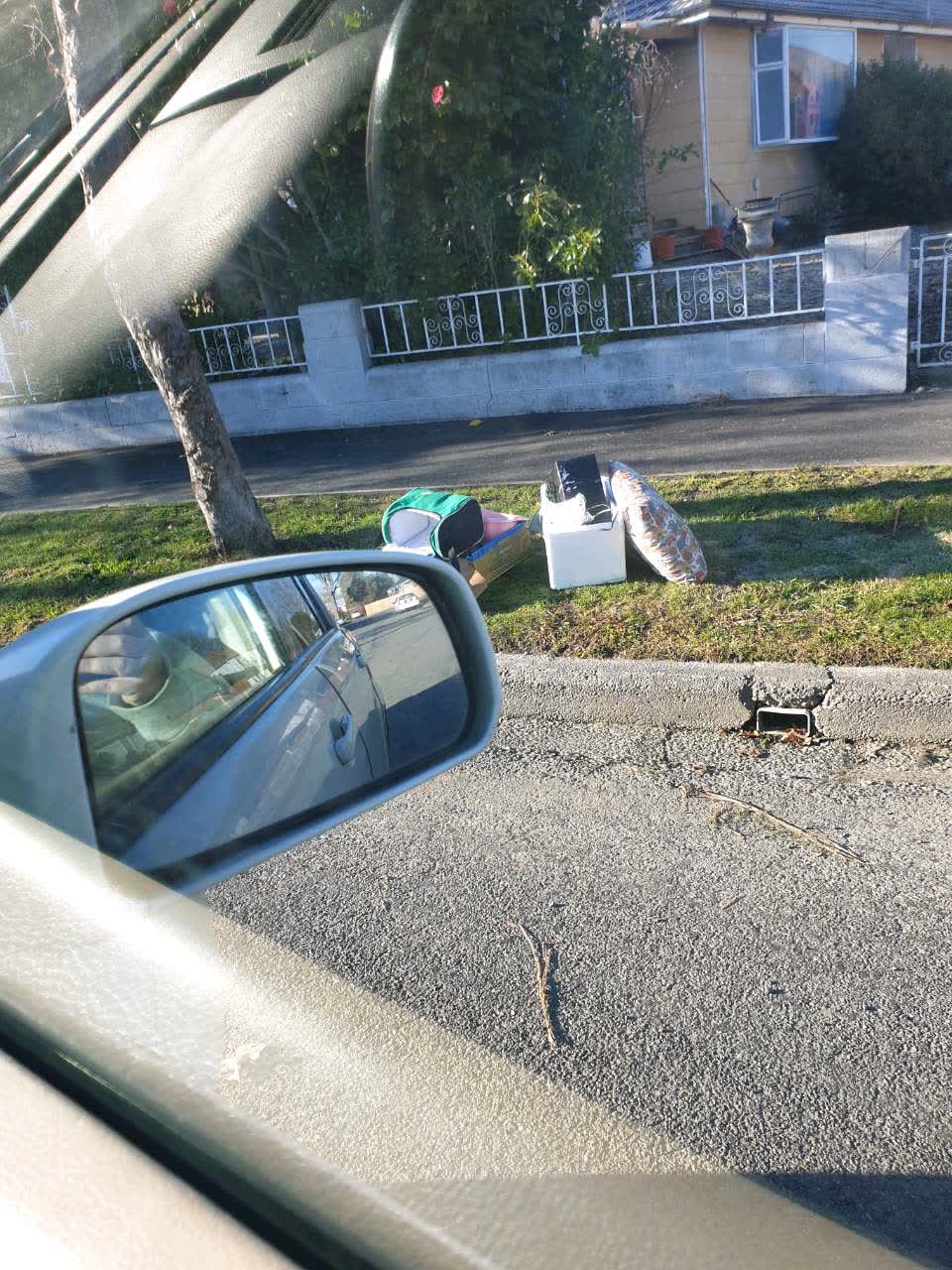 The photograph attached to this rubbish/recycling report