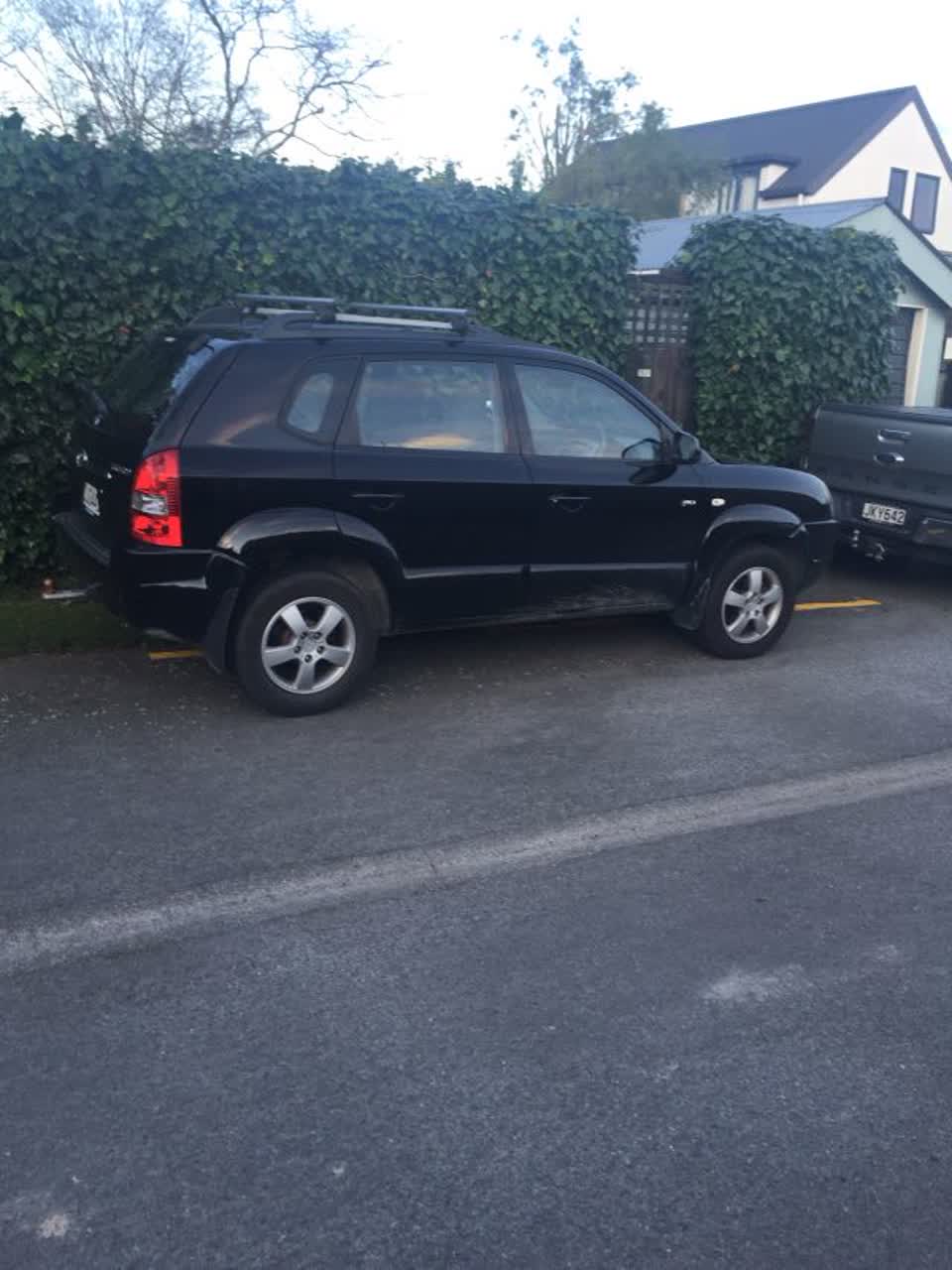 The photograph attached to this parking - illegal report