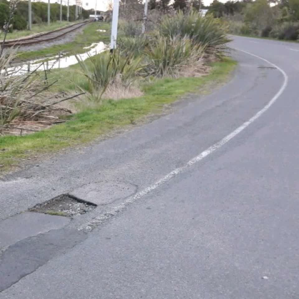 The photograph attached to this pothole report