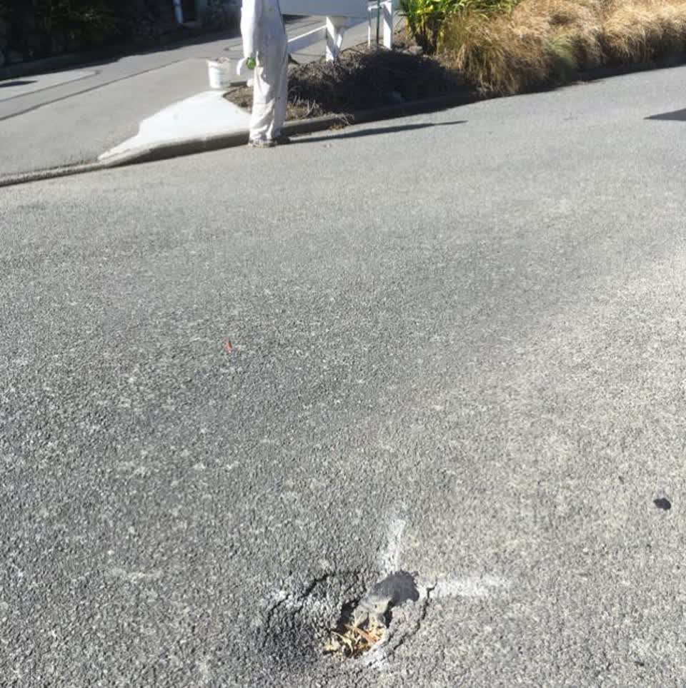 The photograph attached to this pothole report