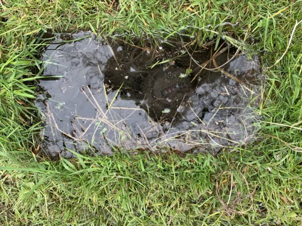 The photograph attached to this flooding report