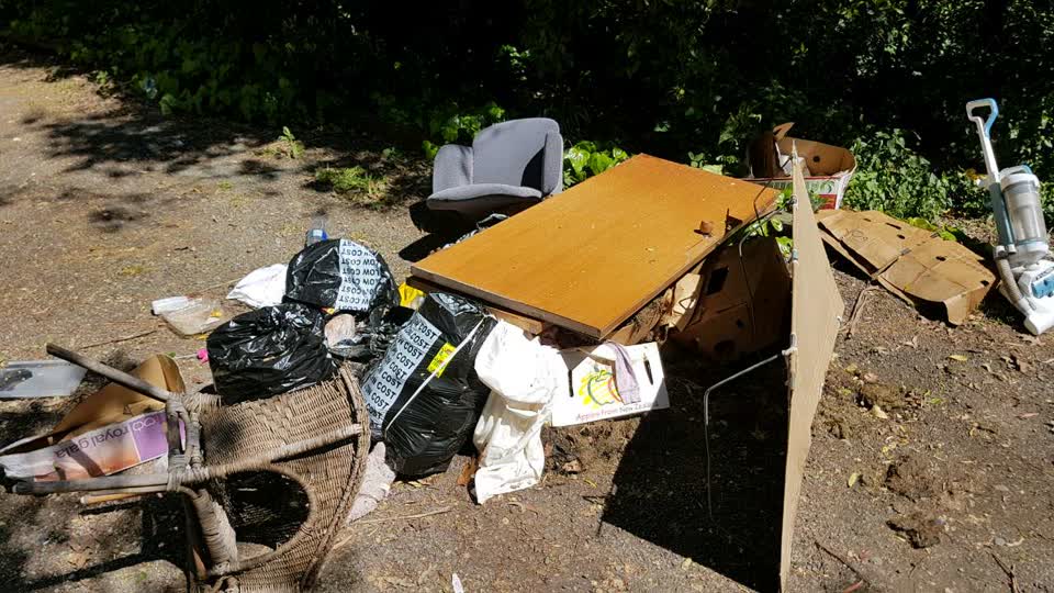 The photograph attached to this rubbish/recycling report