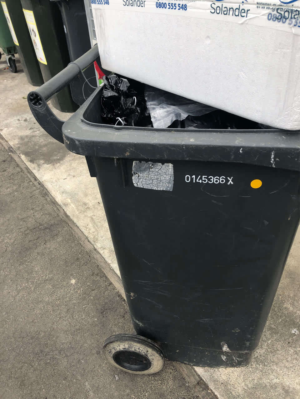 The photograph attached to this rubbish/recycling report