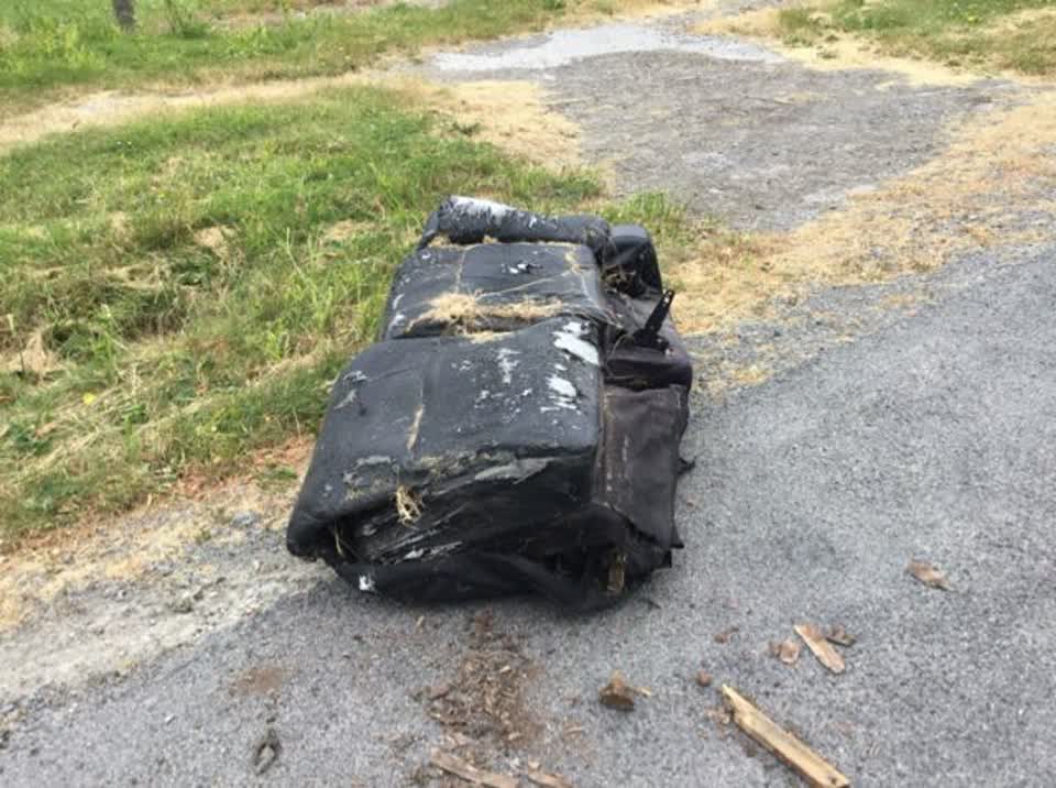 The photograph attached to this rubbish/recycling report