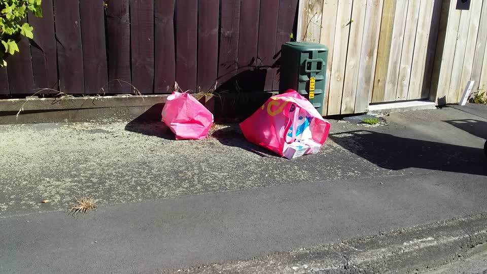 The photograph attached to this rubbish/recycling report