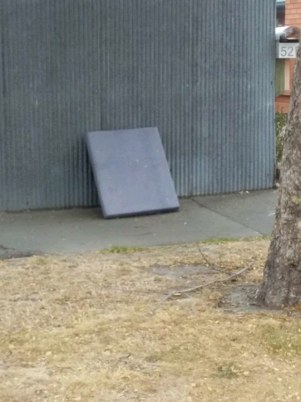 The photograph attached to this rubbish/recycling report