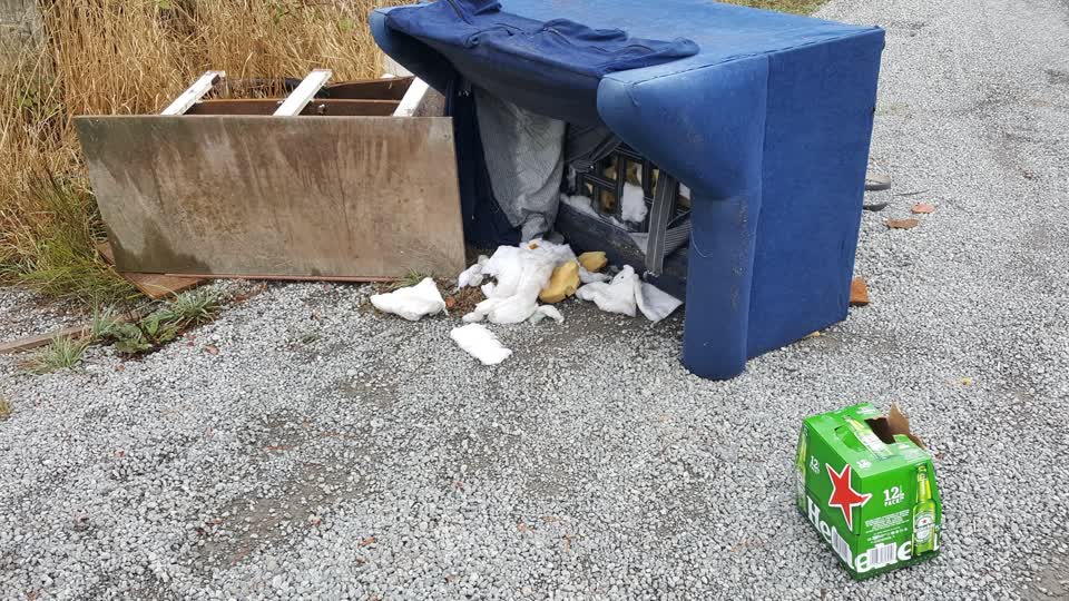 The photograph attached to this rubbish/recycling report