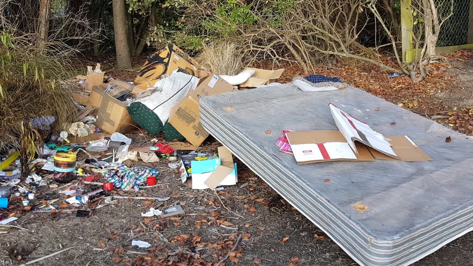 The photograph attached to this rubbish/recycling report