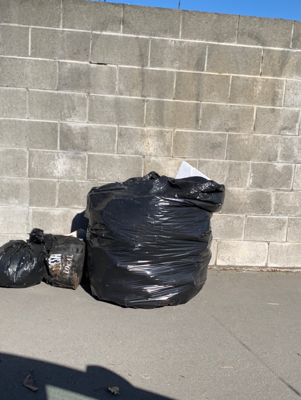 The photograph attached to this rubbish/recycling report
