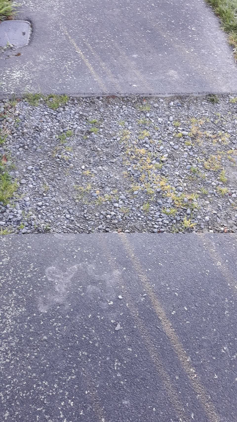 The photograph attached to this pavement - damaged report