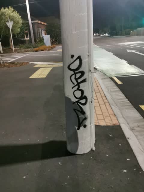 Graffiti - Concrete Street Light Pole, a report photo