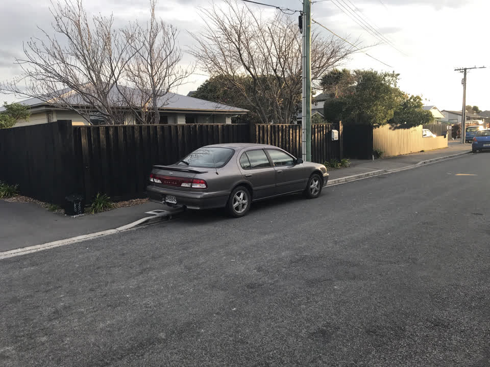 The photograph attached to this parking - illegal report